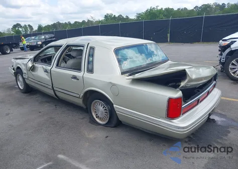 1997 Lincoln Town Car Signature из США, поврежденный, VIN 1LNLM82W3VY746254